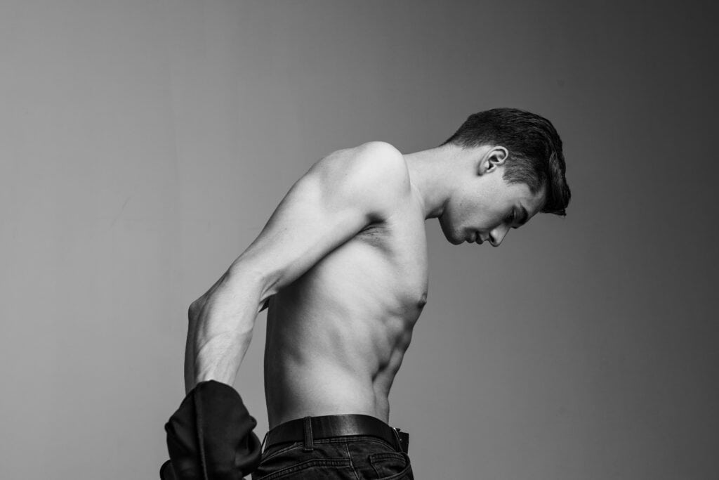 Elegant male model showcasing tailored sewing skills.