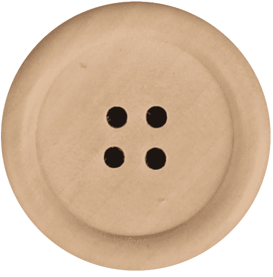 Close-up of a beige four-hole sewing button on fabric.